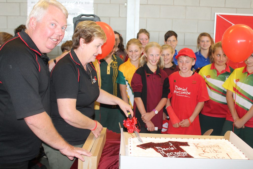 Denise Morcombe cuts the cake as primary school captains watch on. Denise Morcombe cuts the cake as primary school captains watch on.